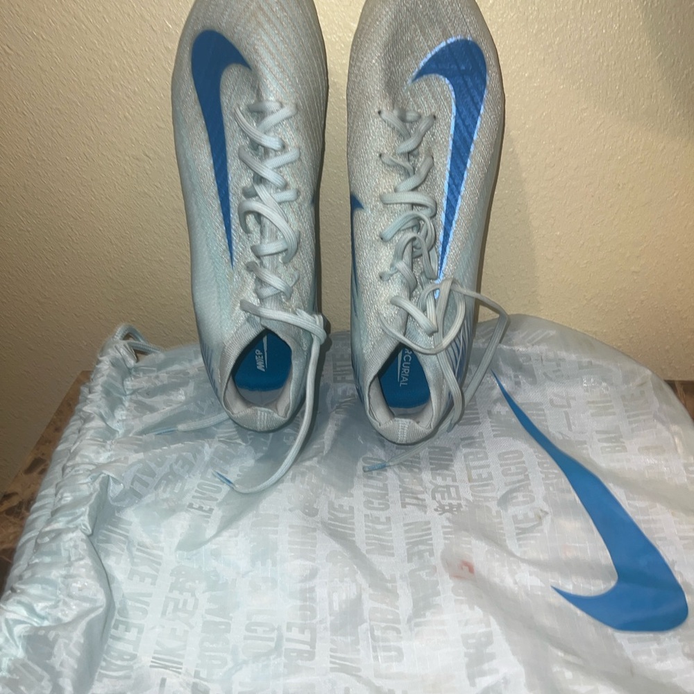 Nike White and Blue Athletic Cleats